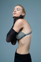 Handmade rhinestone bra top by Mirel Prentice, featuring sparkling embellishments and a stylish design, worn as a trendy fashion top.