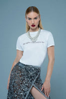 Silver embroidered midi skirt by Mirel Prentice featuring intricate embroidery and a flowing midi length.