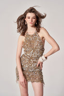 Hand-crocheted Mother of Pearl mini dress by Mirel Prentice, featuring intricate detailing and a stylish, elegant design.