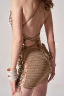 Hand-crocheted Mother of Pearl Mini Dress by Mirel Prentice, showcasing intricate detailing and a stylish fit.