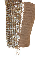 Side view of Mirel Prentice hand-crochet mother of pearl mini dress, showcasing intricate pearl details and elegant fit.
