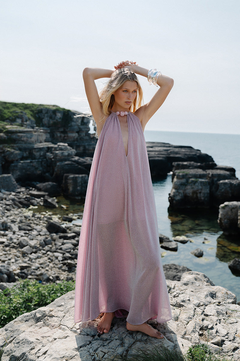 Gigii's Mirissa Maxi Dress in flowy fabric with a vibrant floral pattern, perfect for summer or casual occasions.
