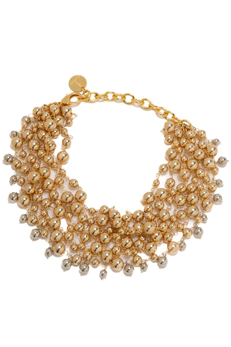 Silver and gold Miru necklace by Silvia Gnecchi, featuring elegant chain design, displayed against a neutral background.