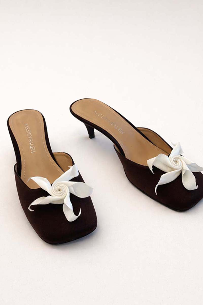 Black Mist heels by Yassmin Saleh featuring a sleek, modern design with a stiletto heel and open toe style.