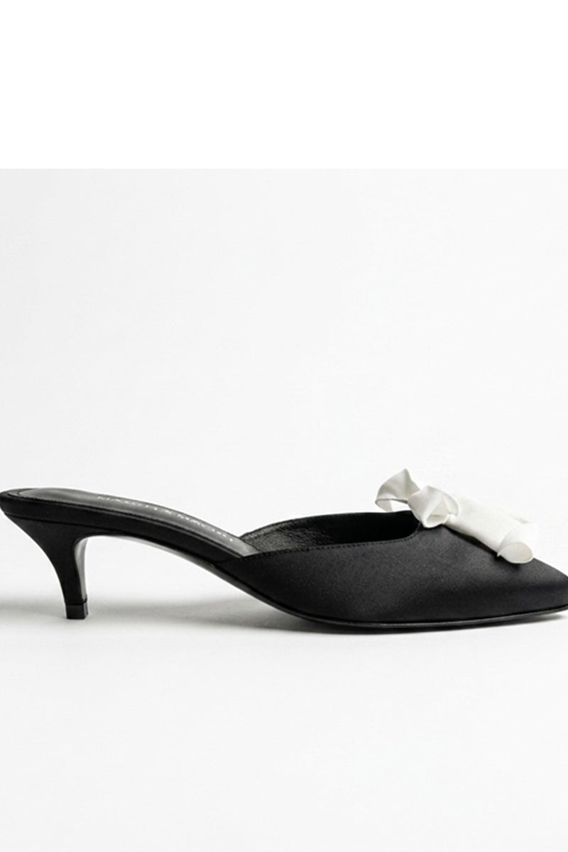 Black Mist Heels by YASSMIN SALEH featuring sleek design and stylish heel, shown on a mannequin inside.
