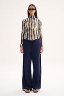 Nelblu SASSI top in blue print cover-up, shown on model featuring lightweight fabric and stylish design.