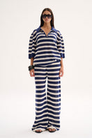 Nelblu Aurora top sweater in blue print worn by model, featuring a stylish and comfortable design.