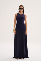 Model wearing Nelblu blue Liz maxi dress, flowing fabric and elegant design perfect for casual or semi-formal occasions.