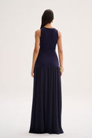 Model wearing Nelblu blue Liz maxi dress, flowing fabric and elegant design perfect for summer or casual occasions.