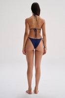 Nelblu LILI top bikini in vibrant print, featuring a stylish design on a model, perfect for swimming and beachwear.