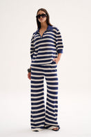 Nelblu Aurora top sweater in print azul worn by model, featuring a stylish and colorful design perfect for casual wear.