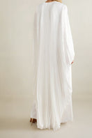 White crystal-embellished plissé satin maxi dress by SemSem, shown from the back on a model. Elegant evening wear.
