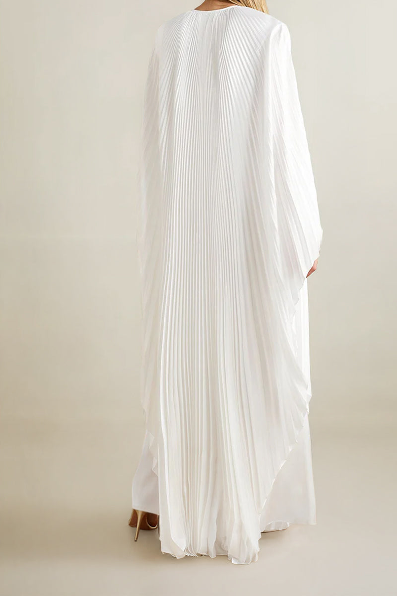 White crystal-embellished plissé satin maxi dress by SemSem, shown from the back on a model. Elegant evening wear.