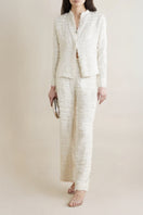 Model wearing a white silk chiffon embellished blouse from SemSem, front view showing delicate detailing and elegant fit.