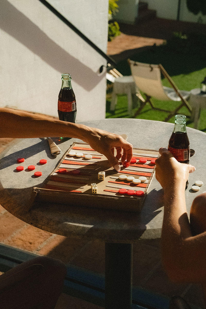 Travel backgammon board in Monaco by Throwing Doubles, featuring a detailed game setup on a stylish Monaco-themed background.
