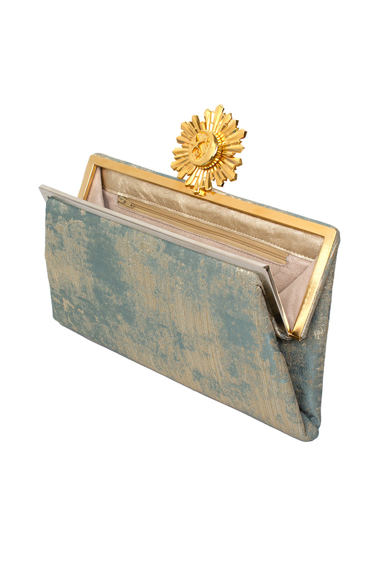Multicolor Moon Rays on Lagoon Grace clutch by Sarah's Bag, featuring intricate design and vibrant details.