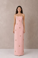 Light pink Moona dress by Nihan Peker, elegant gown with flowing fabric and intricate details, perfect for special occasions.
