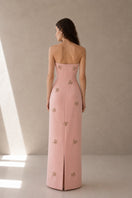 Light pink Moona Dress gown by Nihan Peker featuring elegant fabric and flowing design, perfect for special occasions.