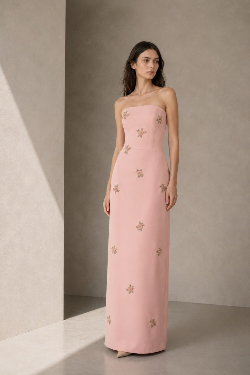 Light pink Nihan Peker Moona Dress gown with flowing fabric and elegant design, perfect for formal occasions.