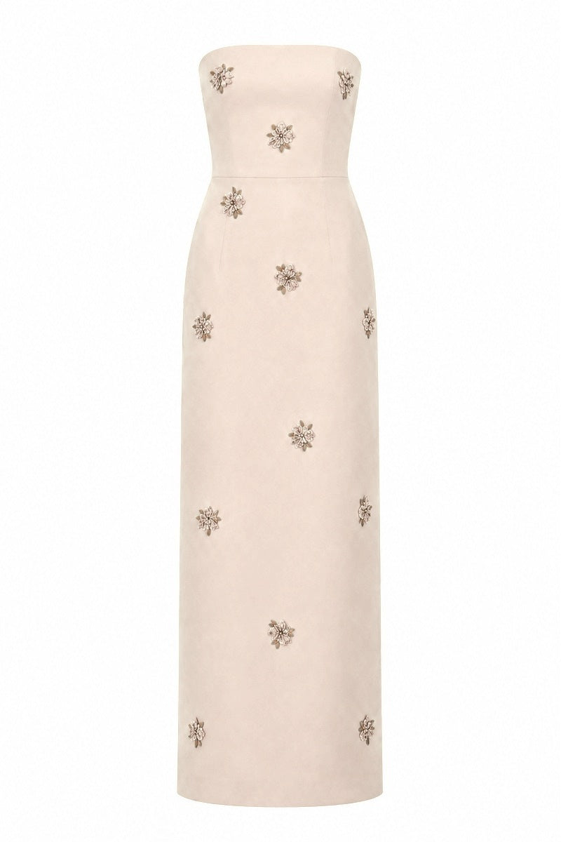 Nihan Peker Moona Dress in vanilla color, elegant gown with flowing fabric and delicate design, perfect for formal occasions.