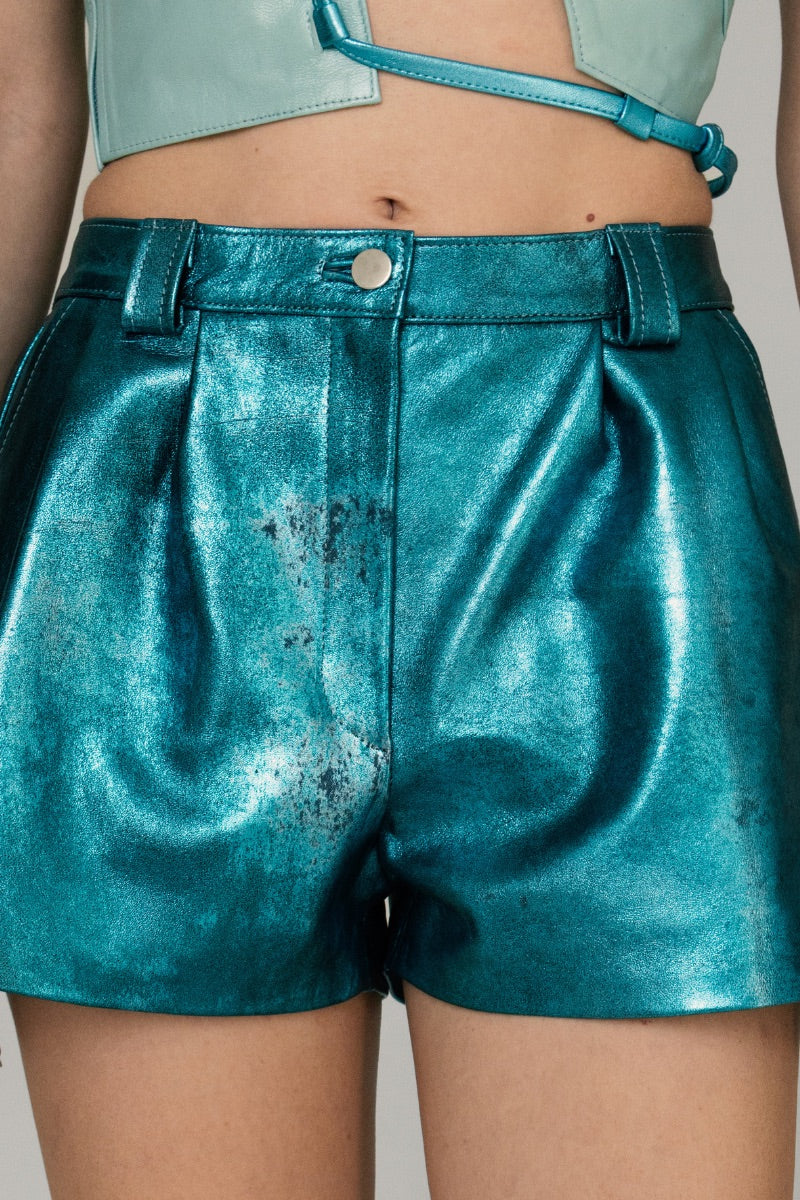 Double A Moonbow leather shorts in washed turquoise, showcasing their stylish, textured finish and relaxed fit.