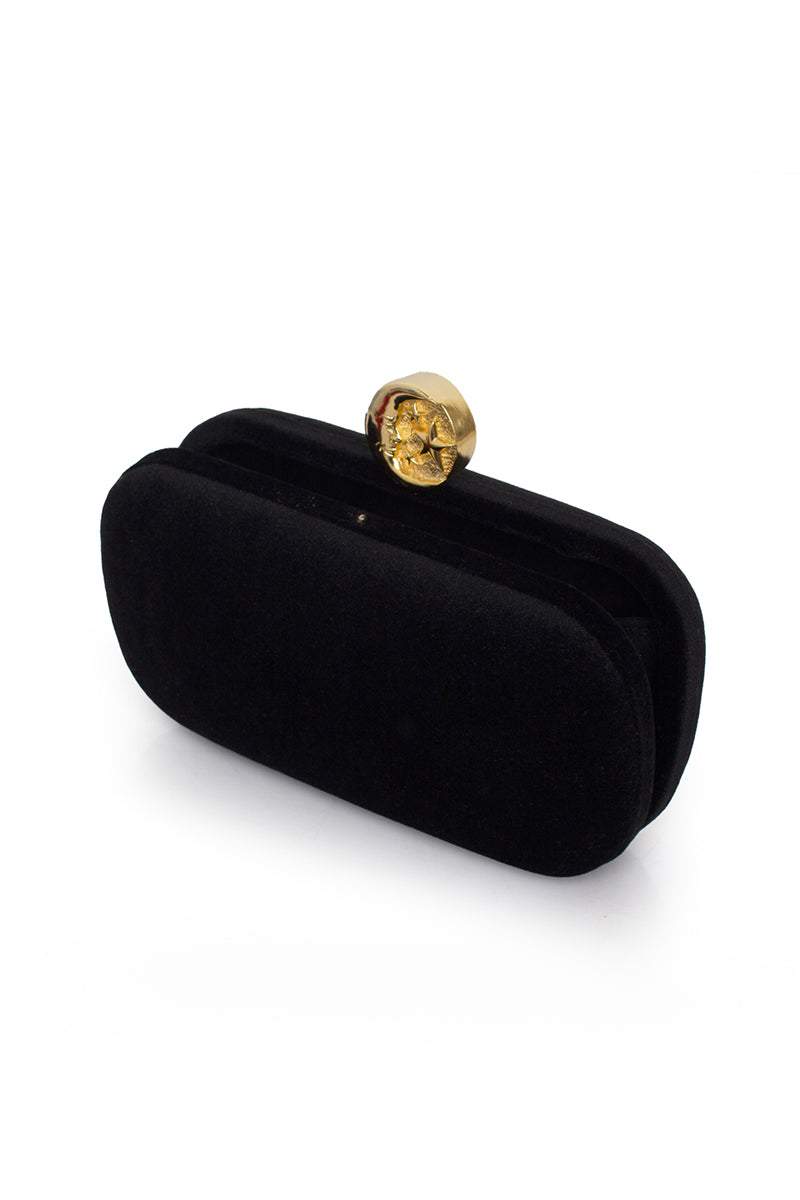 Black velvet clutch purse with moon design by Sarah's Bag, featuring a sleek box shape and elegant craftsmanship.