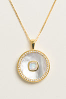 June birthstone moonstone necklace by Freya Rose featuring vermeil gold finish and a delicate moonstone pendant.