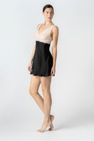 Black NK IMODE Morgan bust support chemise nightgown shown in side profile, featuring a sleek, fitted design and smooth fabric.