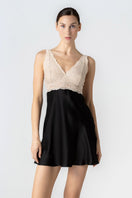 Black NK IMODE CULT MIA X NK IMODE Morgan bust support chemise, front profile showing smooth fabric and fitted design.