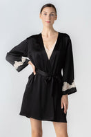 NK IMODE CULT MIA X NK IMODE Morgan short robe in black, front profile showing lightweight fabric and relaxed fit.