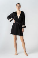 NK IMODE CULT MIA X NK IMODE Morgan short robe in black, front profile view showing lightweight fabric and relaxed fit.