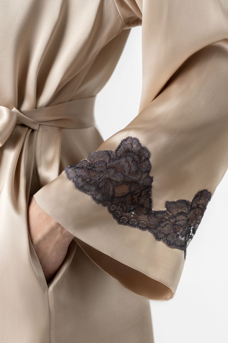 NK IMODE CULT MIA X NK IMODE Morgan short robe in brass, showing detailed fabric and relaxed fit.
