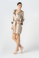 NK IMODE CULT MIA X NK IMODE MORGAN short robe in brass, side profile view showcasing its stylish design and fabric details.