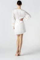 NK IMODE CULT MIA X NK IMODE Morgan short robe in ivory, shown from the back with a stylish, relaxed fit and soft fabric.