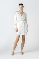 NK IMODE CULT MIA X Morgan short robe in ivory with champagne hue, front profile showcasing soft fabric and relaxed fit.