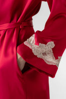 NK IMODE CULT MIA X NK IMODE Morgan short robe in scarlet with champagne accents, featuring soft fabric and stylish design.