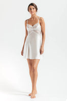 Ivory silk chemise nightgown with cradle bust design by NK IMODE, front view showing smooth fabric and elegant fit.