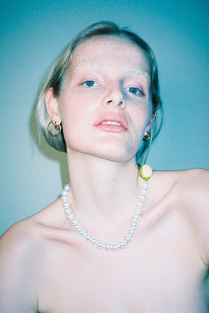 Pura Utz Mother of Lemon necklace featuring a delicate pendant with lemon motif on a fine chain.