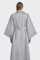 Gray coat from the Ms. Doll collection by Stolen Stores, featuring a stylish, tailored design with a sleek fit and modern silhouette.