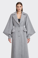 Gray coat from the MS. DOLL collection by Stolen Stores, displayed on a mannequin with stylish details.