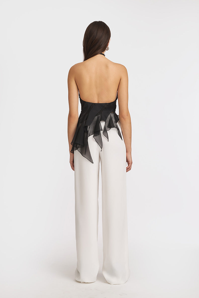 Black MS. Dragon mini top from Stolen Stores, shown on a model, featuring a fitted design and stylish neckline.