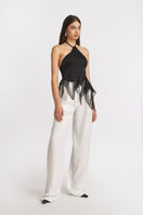 Black MS. Dragon mini top by Stolen Stores, featuring a fitted design and stylish scoop neckline, displayed on a mannequin.