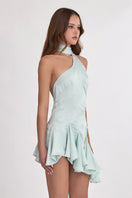Green Ms. Godet asymmetric mini dress by Stolen Stores, featuring a stylish uneven hem and modern design.