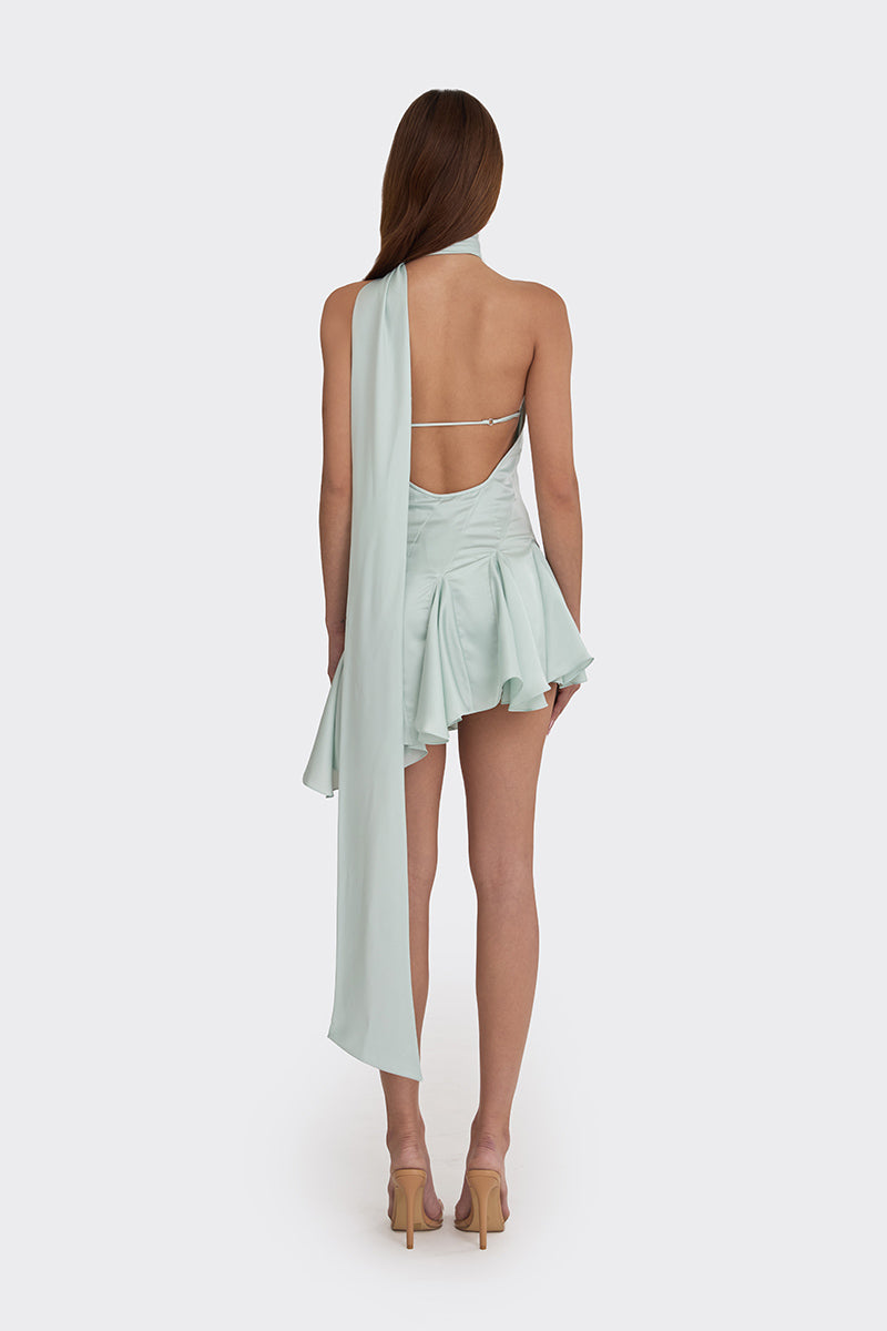 Green MS. GODET asymmetric mini dress by Stolen Stores, featuring a stylish design and modern cut, shown on a model.