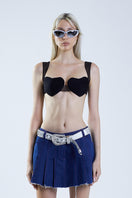 Black MS. Heart bra from Stolen Stores, stylish tops with a comfortable fit, shown alongside a navy blue skirt.