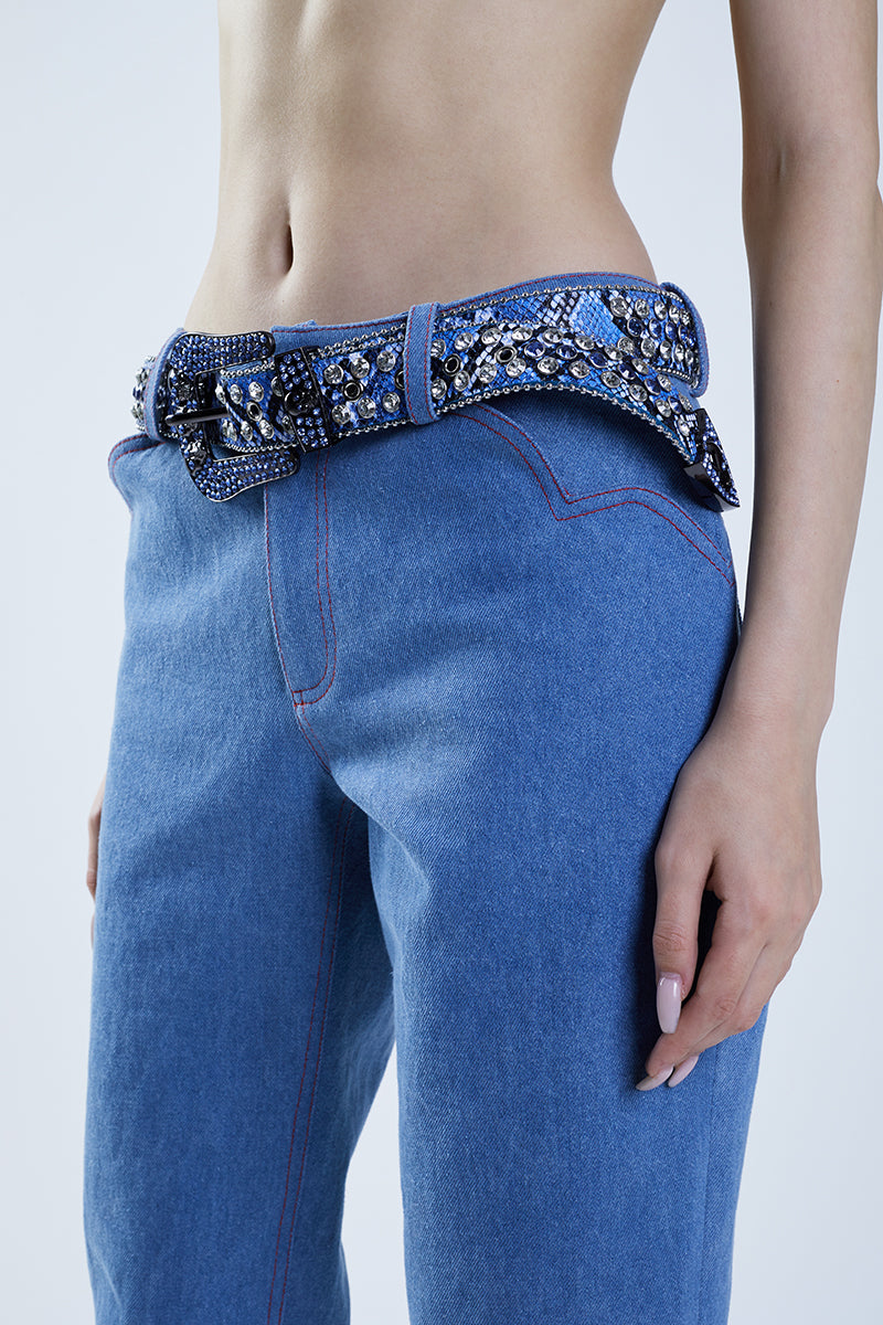 Blue denim MS. Heart pants by Stolen Stores, featuring classic design and stylish fit, shown on a model.