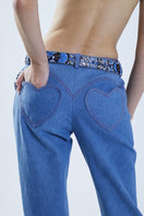 Blue denim pants from Stolen Stores' MS. HEART collection, featuring stylish, casual pants with a relaxed fit.