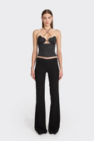 Black side bustier top from Stolen Stores featuring a fitted design and stylish detailing.