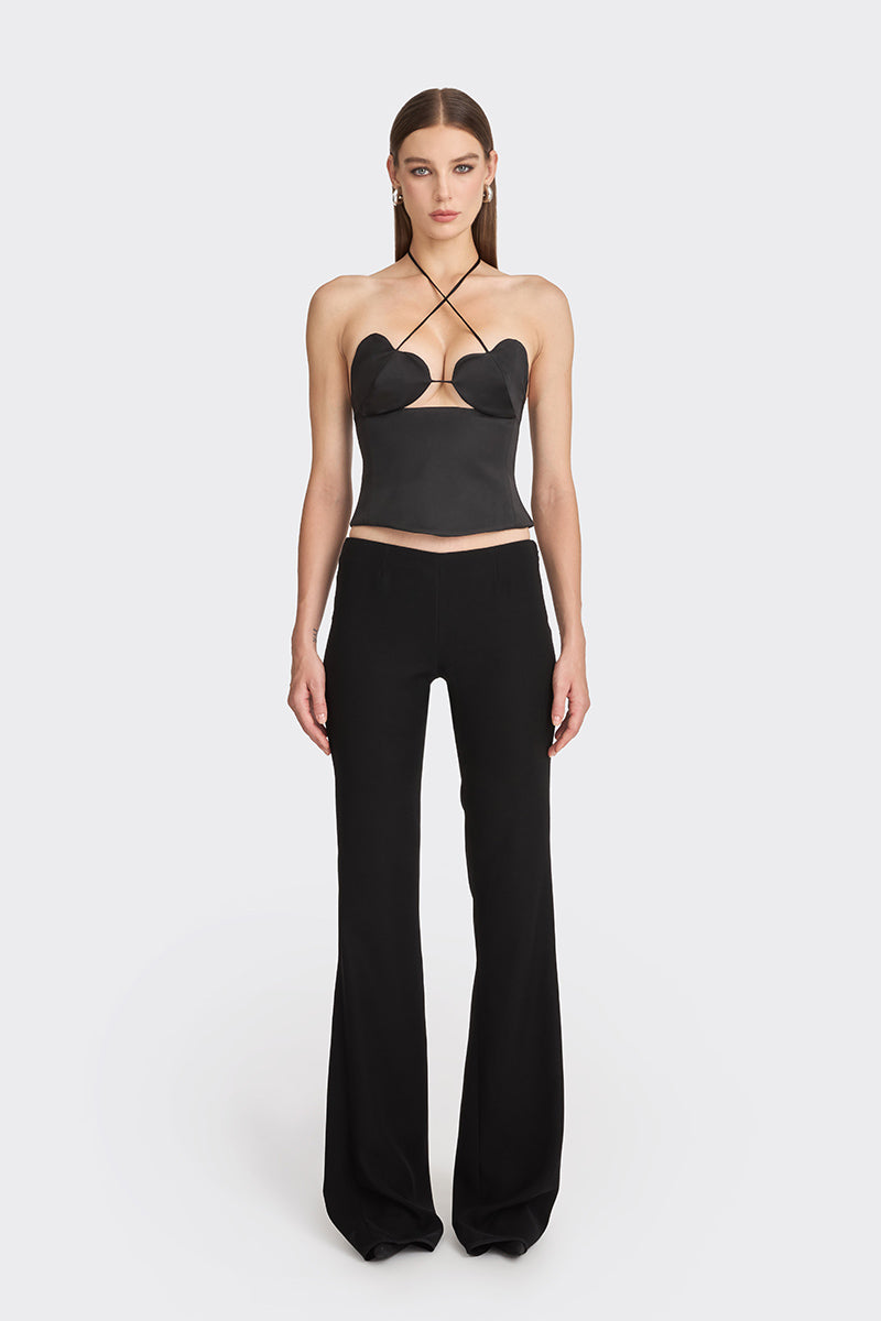 Black side bustier top from Stolen Stores featuring a fitted design and stylish detailing.