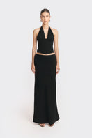 Black MS. Pleat corset top by Stolen Stores featuring pleated fabric and structured design on a model.